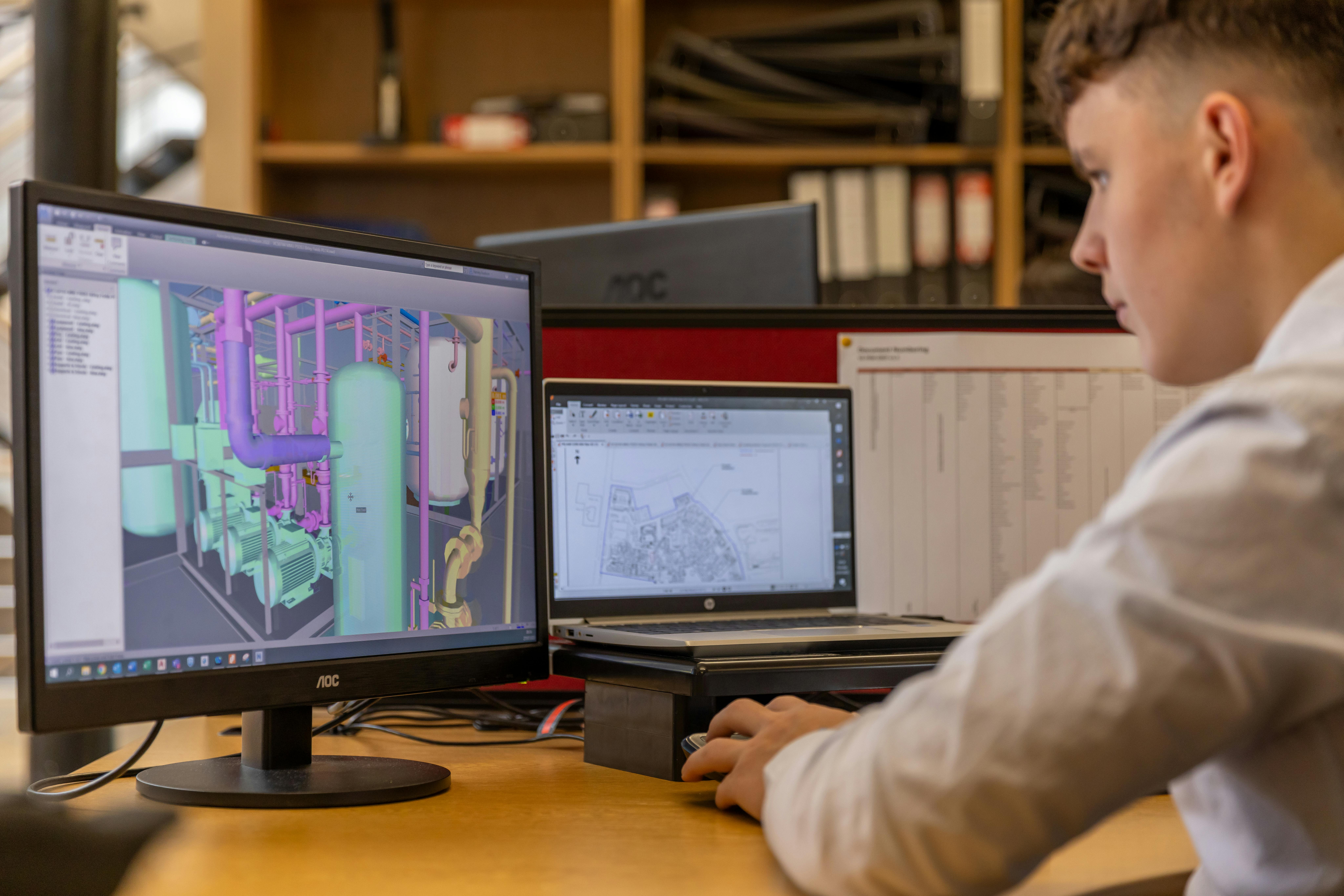 An engineering using Computer Aided Software to Prototype a design.
